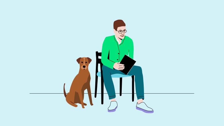 Mann mit Buch und Hund